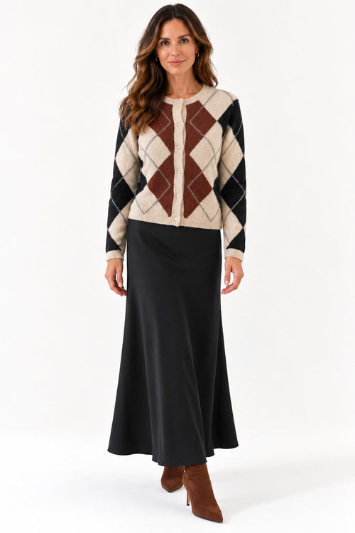 Kokun argyle cardigan in oatmeal, rust and black, styled with a black Bella Dahl slip skirt